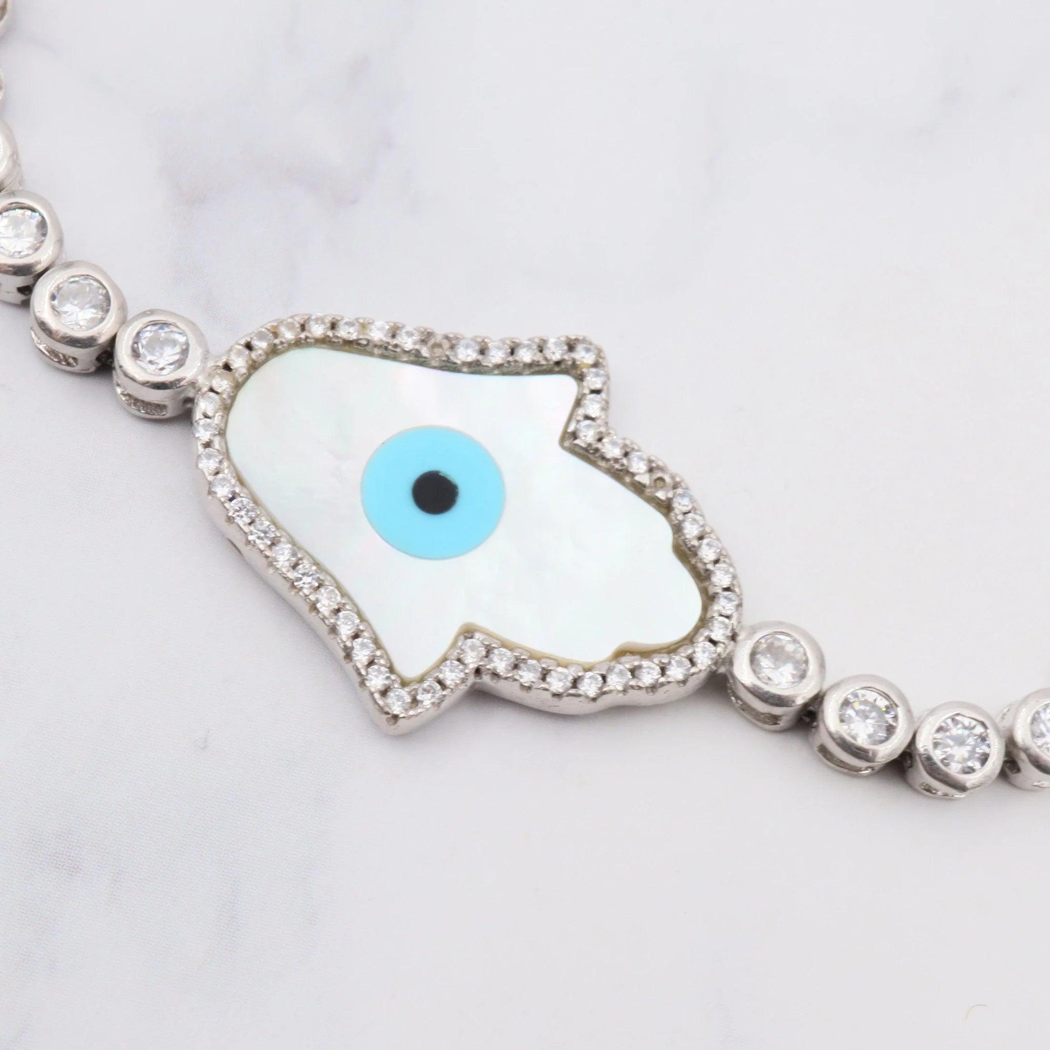 Vintage sterling, mother of pearl, hand of fatima and evil eye bracelet with cubic zirconia links